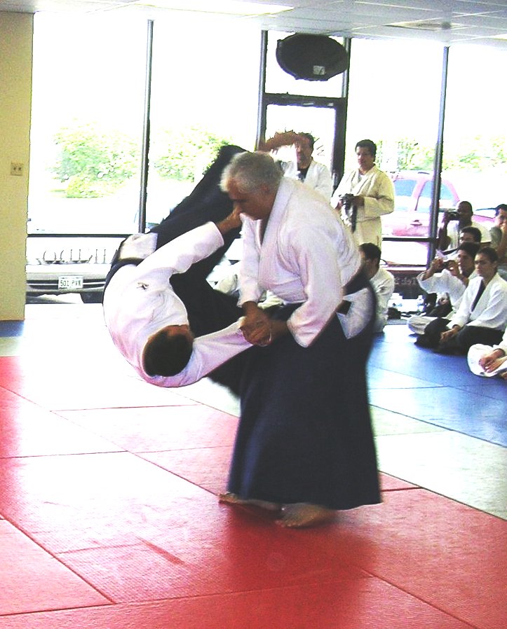 Dr. Jaideep Mukherjee throwing Sensei Albert Pena (uke) as part of his San-dan Test